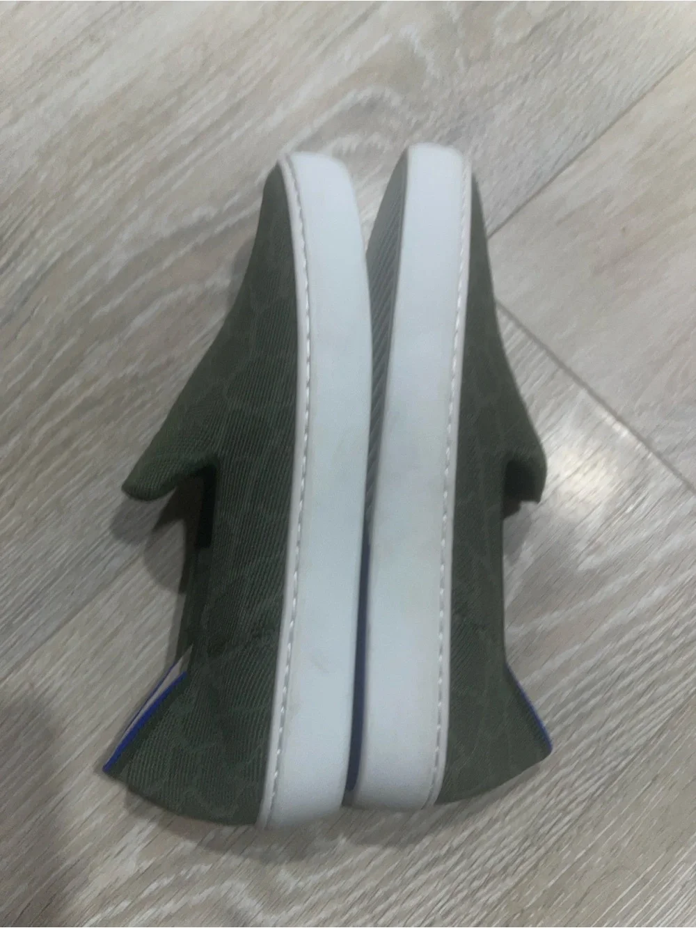 Rothy's Safari Green size 7 woman's Slip-On  sneakers with White Sole